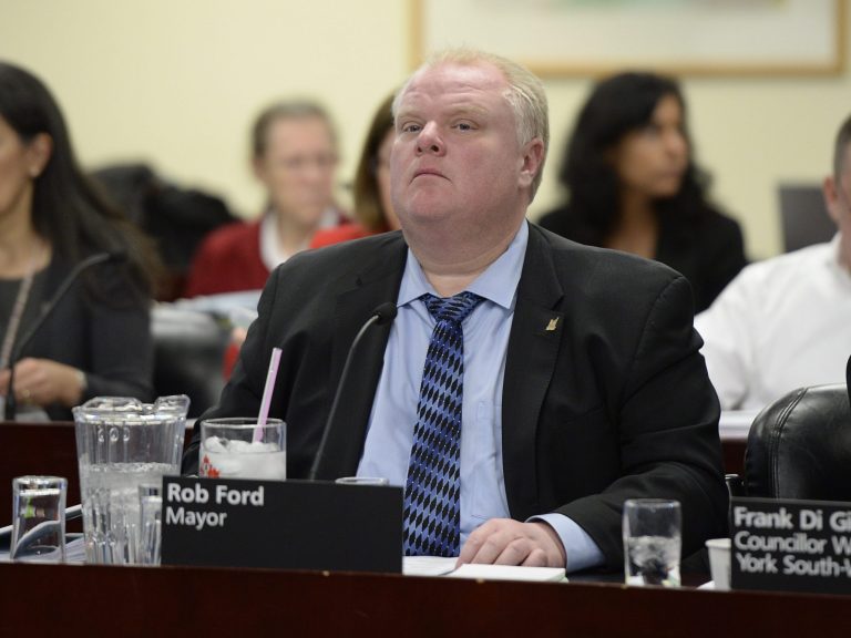 Toronto Mayor Rob Ford attends a budget committee at City Hall in Toronto on Wednesday, Jan.  22, 2014.  The latest controversial video featuring Toronto Mayor Rob Ford provided fresh material for at least one late-night television host Tuesday night. The video of a seemingly incoherent Ford using Jamaican swear words popped up on YouTube and appears to have been filmed inside a restaurant. Ford admitted he had been drinking, after weeks of adamant vows that he had given up alcohol, adding it was on his 