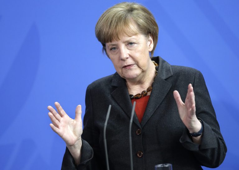 German Chancellor Angela Merkel speaks during a joint press conference with the Prime Minster of Portugal, Pedro Passos Coelho, as part of a meeting at the chancellery in Berlin, Germany, Tuesday, March 18, 2014. (AP Photo/Michael Sohn)