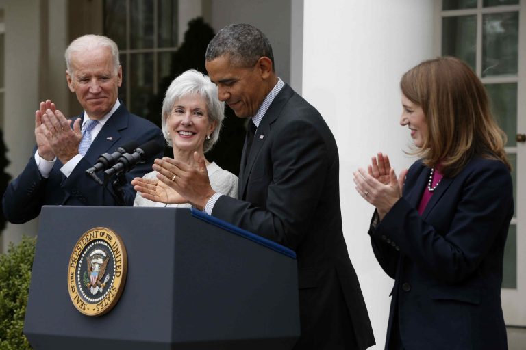 President Barack Obama and Vice President Joe Biden stand with outgoing Health and Human Services Secretary Kathleen Sebelius, second from left, and his nominee to be her replacement, Budget Director Sylvia Mathews Burwell, Friday, April 11, 2014, in the Rose Garden of the White House in Washington. The moves come just over a week after sign-ups closed for the first year of insurance coverage under the so-called Obamacare law. (AP Photo/Charles Dharapak)