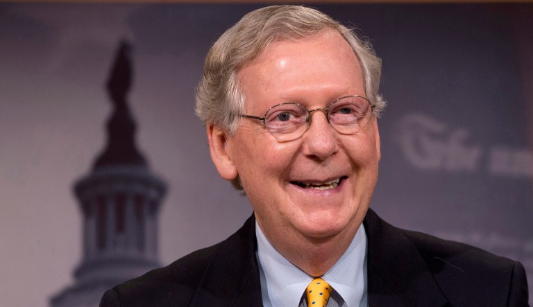 Senate Majority Leader Mitch McConnell's campaign account tweeted a GIF of the leader smiling contently, shortly after Trump slammed his former senior adviser Steve Bannon in a statement for his comments in a new book excerpt. (AP Photo/Jacquelyn Martin)