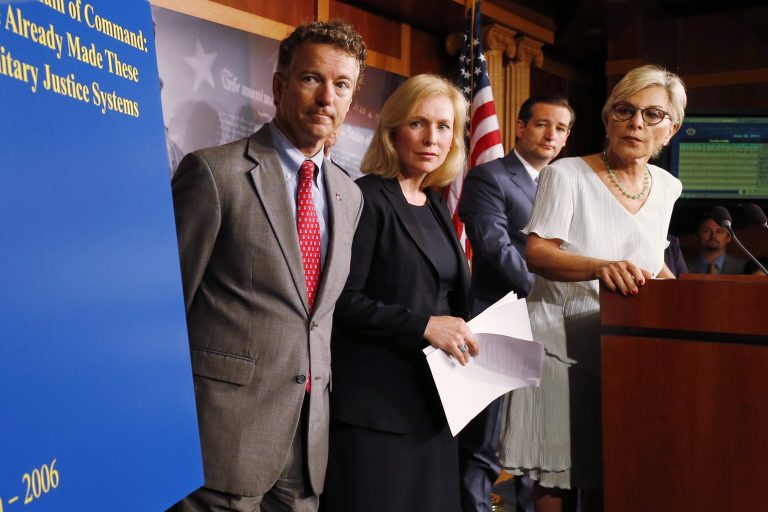 Sens. Kirsten Gillibrand, D-N.Y., Rand Paul, R-Ky., Ted Cruz, R-Texas, and Barbara Boxer, D-Calif., look towards a chart as they speak to reporters during a news conference about a bill regarding military sexual assault cases on Capitol Hill on Tuesday. (AP/Charles Dharapak)