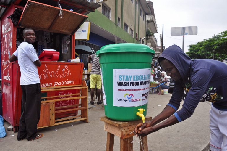 A man washes his hands in a attempt to stop the spread of the deadly Ebola virus in the city of Monrovia, Liberia, Wednesday, Aug. 6, 2014.  The World Health Organization has begun an emergency meeting on the Ebola crisis, and said at least 932 deaths in four African countries are blamed on the virus, with many hundreds more being treated in quarantine conditions. (AP Photo/Abbas Dulleh)