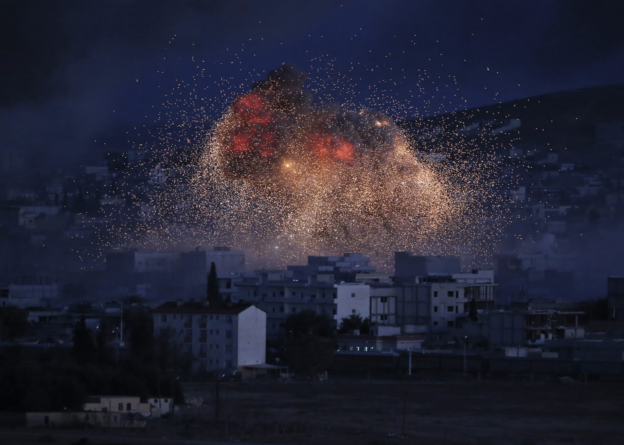 US, allies conduct 12 air strikes against the Islamic State