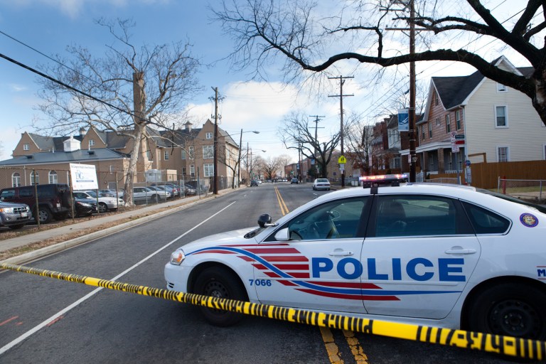 Police at the scene of a shooting in SE Washington D.C where three people were shot at Martin Luther King Elementary school.