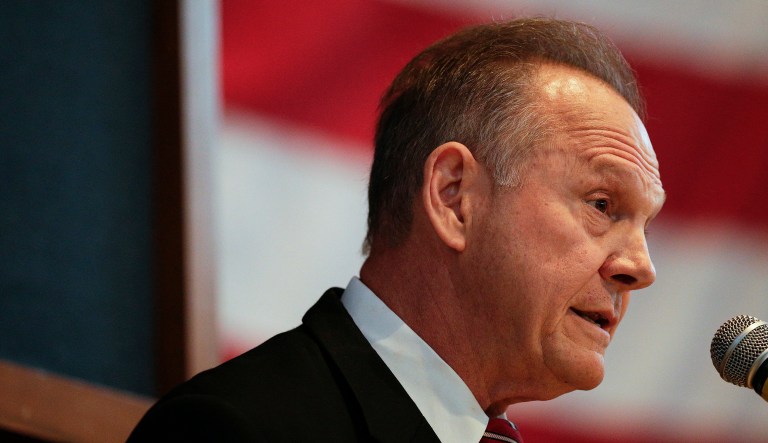 Backers of Alabama Republican senatorial candidate Roy Moore are uncommonly loyal. But it's unclear whether such allegations of sexual misconduct will now undo his lead in the deep-red state. (AP Photo/Brynn Anderson)