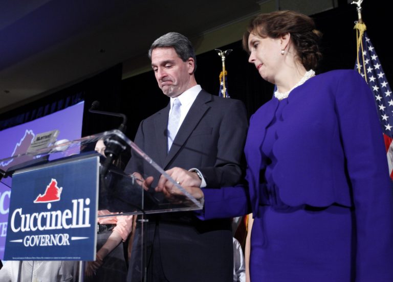 Republican KenÃÂ CuccinelliÃÂ stands with his wife, Teiro, as he gives his concession speech in Richmond, Va., after losing the governor's race Tuesday. (AP/Bob Brown).