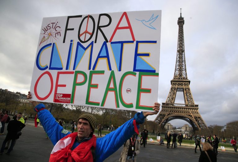 The climate agreement was unanimously approved in Paris by the 21st Conference of the Parties, or COP21, in a final vote Saturday afternoon. (AP Photo/Thibault Camus)