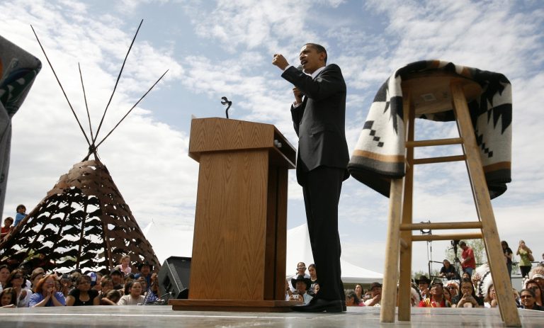 FILE - This May 19, 2008 file photo shows then-Democratic presidential hopeful, Sen. Barack Obama, D-Ill., campaigning in Crow Agency, Mont. President Barack Obama says he'll visit a Native American reservation in North Dakota next week on his first trip to Indian Country as president. Obama says he and first lady Michelle Obama will visit the Standing Rock Sioux Tribe in Cannonball. He says the reservation holds a special place in U.S. history because Chief Sitting Bill lived there.  (AP Photo/Chris Carlson, File)