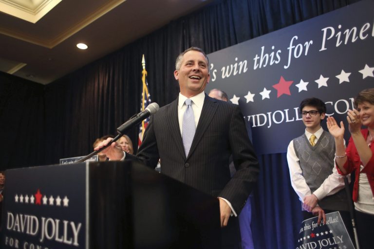 Republican David Jolly smiles Tuesday in Clearwater Beach, Fla., after defeating Democrat Alex Sink in an election to the U.S. House, to replace 42-year Republican Rep. CW Bill Young, who died in October of cancer. (AP/Tampa Bay Times, Chris Zuppa)