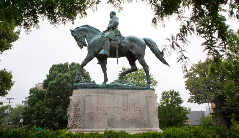 A statue of Confederate Gen. Robert E. Lee sits in Emancipation Park in Charlottesville, Va. Virginia Gov. Terry McAuliffe, D-Va., argued Thursday that it may be difficult for cities to prioritize the dismantling of Confederate monuments given all the other funding priorities they have. (AP Photo/Julia Rendleman, File)