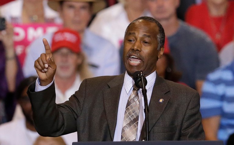 Carson gave an introduction before Trump started his controversial speech in which he rehashed his statements following the deadly Charlottesville protests in August. (AP Photo/Rick Scuteri)