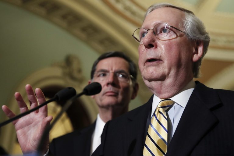 In this July 26, 2017 photo, Sen. John Barrasso, R-Wyo. watches at left as Senate Majority Leader Mitch McConnell of Ky. speaks during a news conference on Capitol Hill in Washington, Tafter the Senate voted on health care legislation. Republican hopes for repealing and replacing President Barack Obama's health care law are still twitching in Congress, though barely. It's among several health issues lawmakers face when they return from summer recess, even as fights over the budget and helping Texas recover from Hurricane Harvey grab center stage. (AP Photo/Jacquelyn Martin)