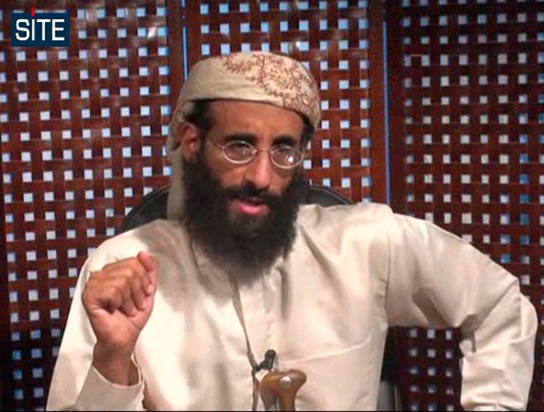 FILE - In this image taken from video and released by SITE Intelligence Group on Monday, Nov. 8, 2010, Anwar al-Awlaki speaks in a video message posted on radical websites. On Friday, April 4, 2014, U.S. District Judge Rosemary Collyer dismissed a lawsuit against Obama administration officials for the 2011 drone-strike killings of three U.S. citizens in Yemen, including U.S.-born al-Qaida leader al-Awlaki. Collyer said the case raises serious constitutional issues and is not easy to answer, but that 
