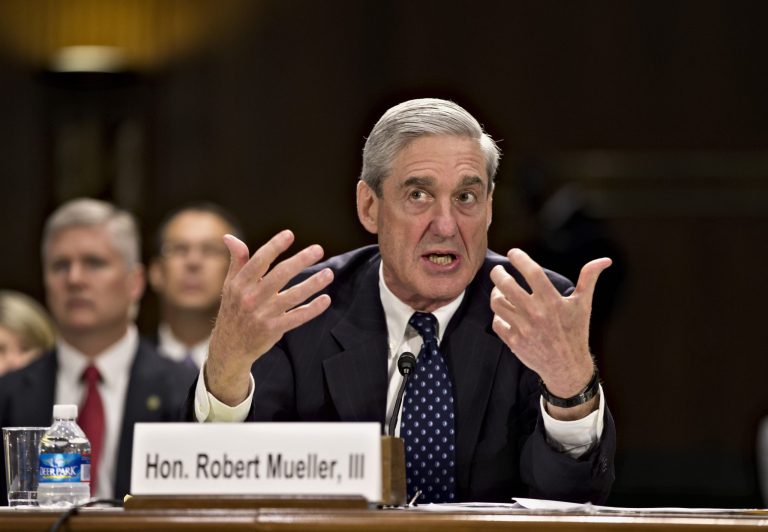 AP/J. Scott Applewhite 
FBI Director Robert Mueller testifies on Capitol Hill in Washington on Wednesday before a Senate Judiciary Committee hearing on national security matters.