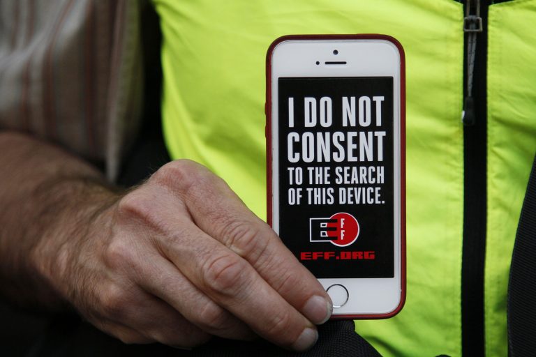 Protesters assembled in more than 30 cities to lash out at the FBI for obtaining a court order that requires Apple to make it easier to unlock an encrypted iPhone used by a gunman in December's mass murders in California. (AP Photo/Eric Risberg)