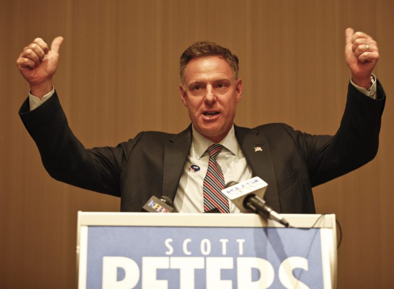 Democratic Representative from the 52nd district Scott Peters addresses his supporters during post voting activities Tuesday, Nov. 4, 2014, in San Diego. (AP Photo/Lenny Ignelzi)