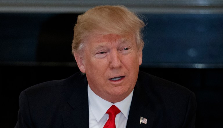 The Trump administration is slapping new sanctions on 18 Iranian individuals, groups and networks over non-nuclear behavior. (AP Photo/Evan Vucci)