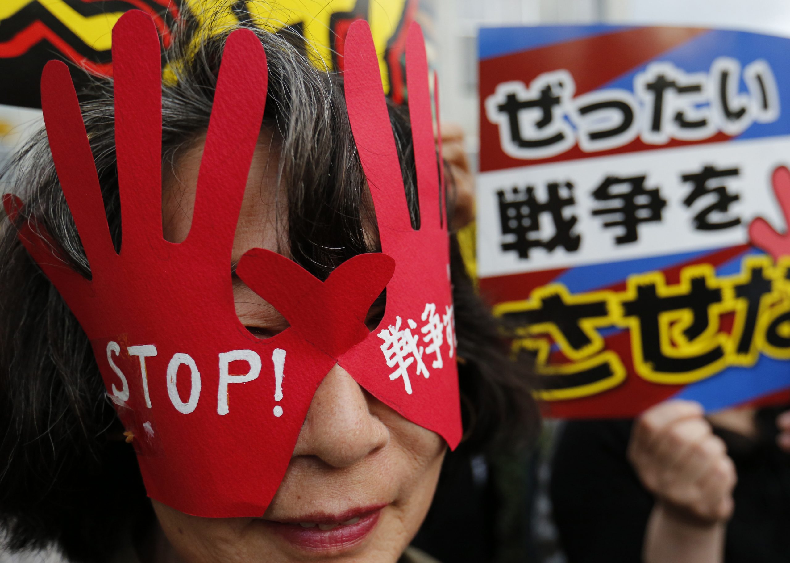 Japan ruling bloc near agreement on security shift