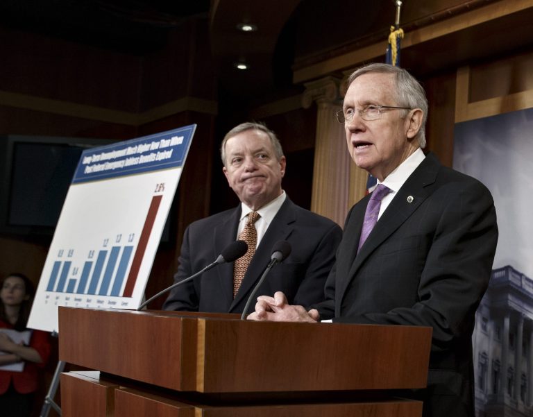 Senate Majority Leader Harry Reid, D-Nev., center, joined by Senate Majority Whip Dick Durbin, D-Ill., talks to reporters about an unemployment insurance extension measure, at the Capitol in Washington on Thursday. (AP Photo/J. Scott Applewhite)
