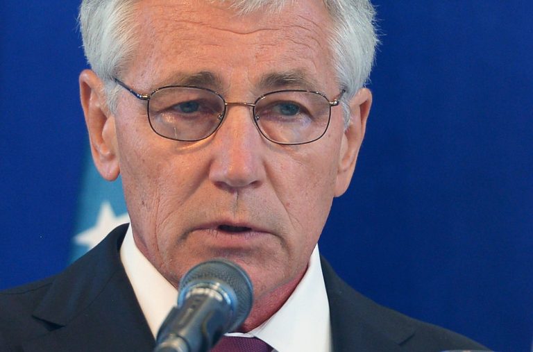 Russian President Vladimir Putin's foreign policy actions suggest that he wants to restore the old Soviet Union, Defense Secretary Chuck Hagel said when asked about U.S. intelligence reveals about the former KGB spy's 