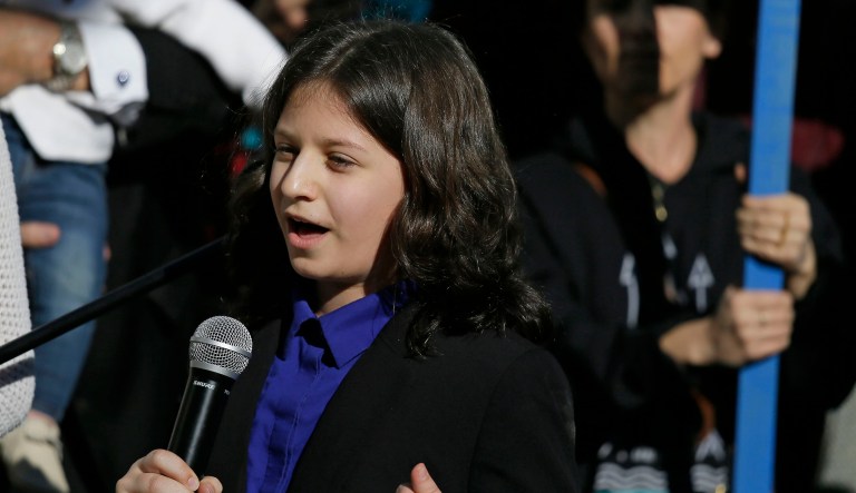 Plaintiff Hazel V., 13, of Eugene, Ore., spoke during a news conference outside the 9th Circuit Court of Appeals after a three-judge panel heard oral arguments over whether President Trump and his administration can evade a constitutional climate change trial. (AP Photo/Eric Risberg)