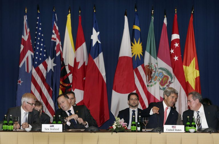 Secretary of State John Kerry, second from the right, speaks with U.S. Trade Representative Michael Froman, at the Trans-Pacific Partnership meeting in Bali, Indonesia, on Oct. 8. (AP Photo/Wong Maye-E)