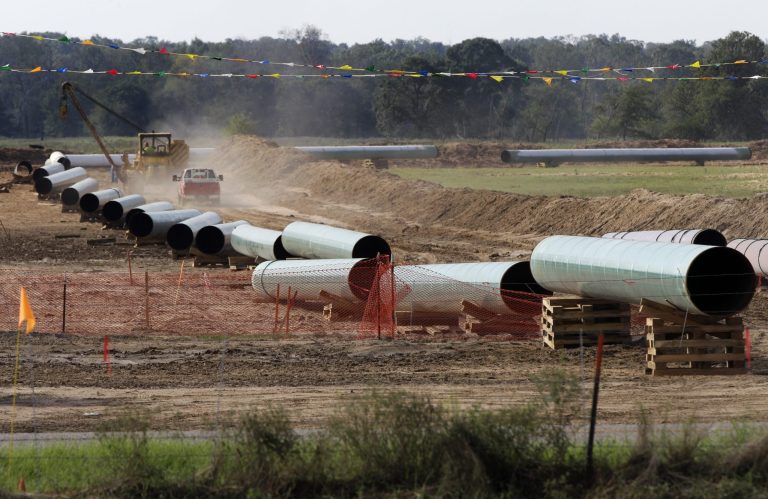 Large sections of pipe are shown on a neighboring property to Julia Trigg Crawford family farm in Sumner, Texas. (AP/Tony Gutierrez)