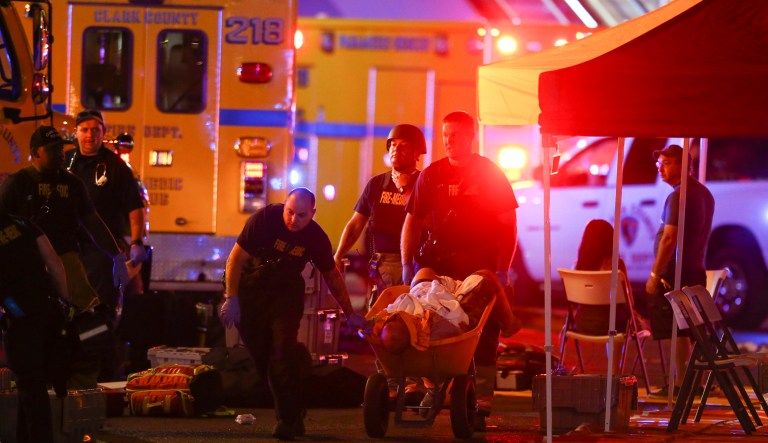 Multiple victims were being transported to hospitals after a shooting late Sunday at a music festival on the Las Vegas Strip. Former President Barack Obama offered his thoughts and prayers on Monday to the victims of Sunday night's shooting. (Chase Stevens/Las Vegas Review-Journal via AP)