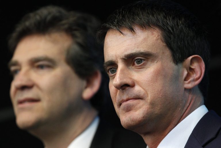 FILE-  This April 10, 2014, shows French prime minister Manuel Valls, right, and Economy Minister Arnaud Montebourg during a visit to French defense and electronic company Thales in Gennevilliers, outside Paris, France. French President Francois Hollande is dissolving the government after an open feud in his Cabinet over the countryâs economy.
Prime Minister Manuel Valls offered up his Socialist governmentâs resignation Monday after accusing his economy minister,  Arnaud Montebourg , of crossing a line with open criticism of the governmentâs policies.(AP Photo/Christophe Ena, File)