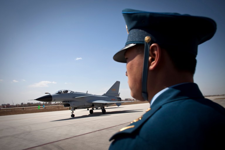 The amendment comes as the two countries clash over China's land claims in the South China Sea. (AP Photo/Alexander F. Yuan)