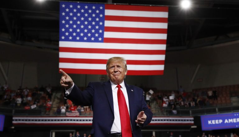 President Donald Trump reacts at the end of his speech at a campaign rally.