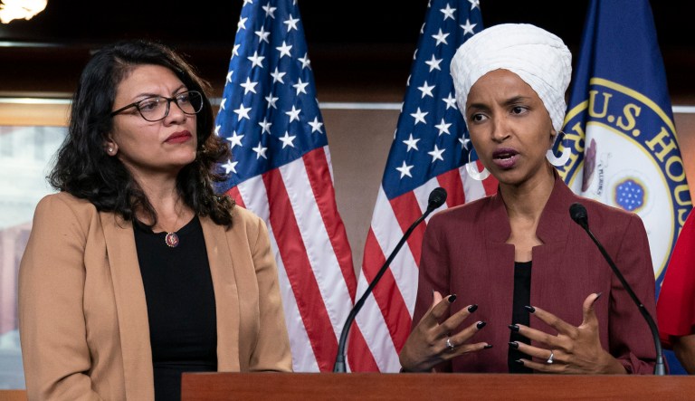 U.S. Rep. Ilhan Omar, right, speaks, as U.S. Rep. Rashida Tlaib, D-Mich. listens, during a news conference at the Capitol in Washington.