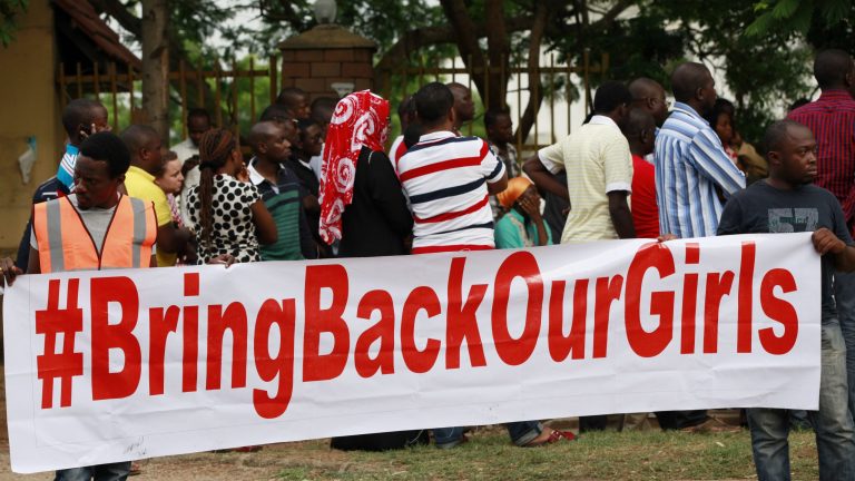 People attend a rally calling on the Government to rescue the school girls kidnapped from the Chibok Government secondary school, in Abuja, Nigeria, Saturday May 10, 2014. The president of Nigeria for weeks refused international help to search for more than 300 girls abducted from a school by Islamic extremists, one in a series of missteps that have led to growing international outrage against the government. The waiting has left parents in agony, especially since they fear some of their daughters have been forced into marriage with their abductors for a nominal bride price of $12. Boko Haram leader Abubakar Shekau called the girls slaves in a video this week and vowed to sell them. 