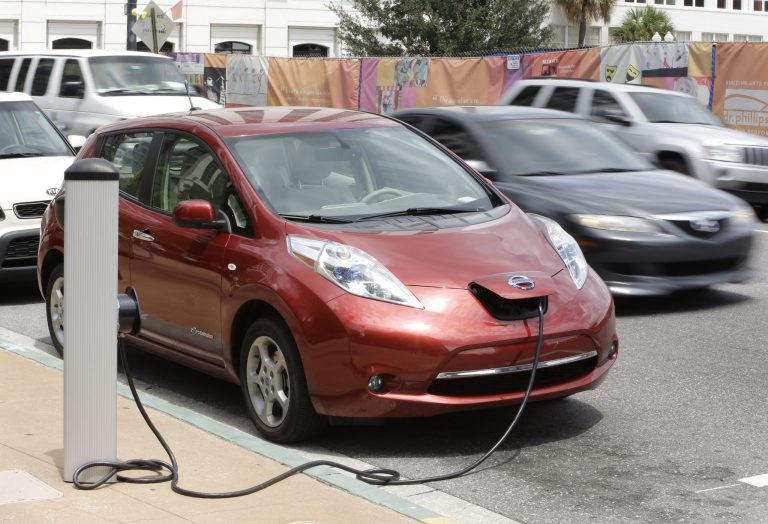 Some of Ecotality's charging stations cost nearly three times as much as the original budgeted cost. (AP/John Raoux)