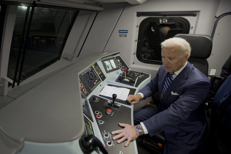 Earlier this month, Biden was photographed viewing a new electric Amtrak locomotive, which Meyers showed to the crowd. (AP Photo)