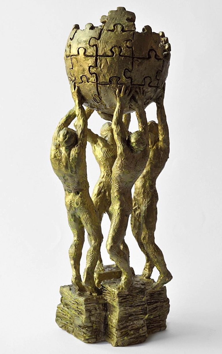 In this image made available from Krzysztof Wojciechowski of the Collegium Polonicum in Slubice, Poland, a model statue which has been put forward by university professor Krzysztof Wojciechowski as a monument tribute to honor the authors of the online Internet encyclopedia site Wikipedia, which will be unveiled in the western Polish town of Slubice, it is announced Thursday Oct. 9, 2014. The monument will be unveiled in Slubice, Poland,  on Oct.22 to honor the authors of Wikipedia.  The online encyclopedia is hugely popular in Poland, with more than 1 million Polish entries in Wikipedia. (AP Photo/ Adam Czernenko, Krzysztof Wojciechowski of the Collegium Polonicum in Slubice)