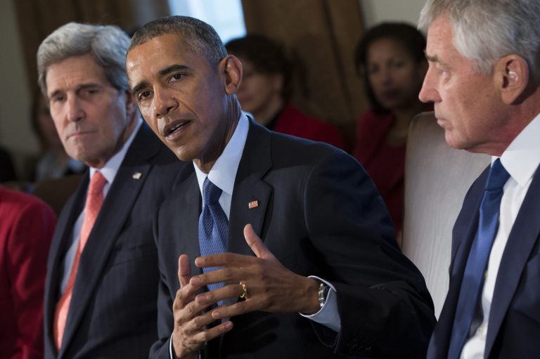 Secretary of State John Kerry, left, and Secretary of Defense Chuck Hagel, right, look on as President Barack Obama delivers remarks on his budget proposal during a cabinet meeting in the Cabinet Room of the White House, on Tuesday, Feb. 3, 2015, in Washington. (AP Photo/Evan Vucci)
