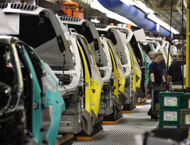   FILE - This May 8, 2008 file photo shows the production line at the BMW assembly plant in Greer, S.C. It has been 20 years since BMW announced it would build an automotive plant in South Carolina. Two decades later, the plant churns out 30,000 vehicles a month and remains a touchstone in the stateâs modern history. (AP Photo/The Greenville News, Ken Osburn, File)  
