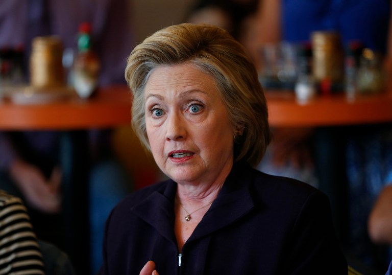 Hillary Clinton' platform amounts to $1.8 trillion in new spending and tax breaks, but also includes enough new tax increases and other government savings that her platform wouldn't significantly add to the federal debt. (AP Photo/Paul Sancya)