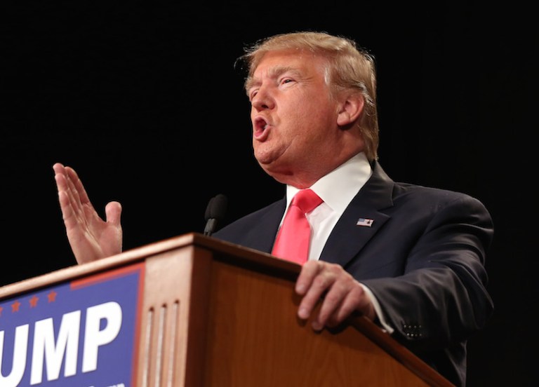 Trump compared the treatment of Christians to Muslims at a rally in Sioux Center. (AP Photo/Isaac Brekken)