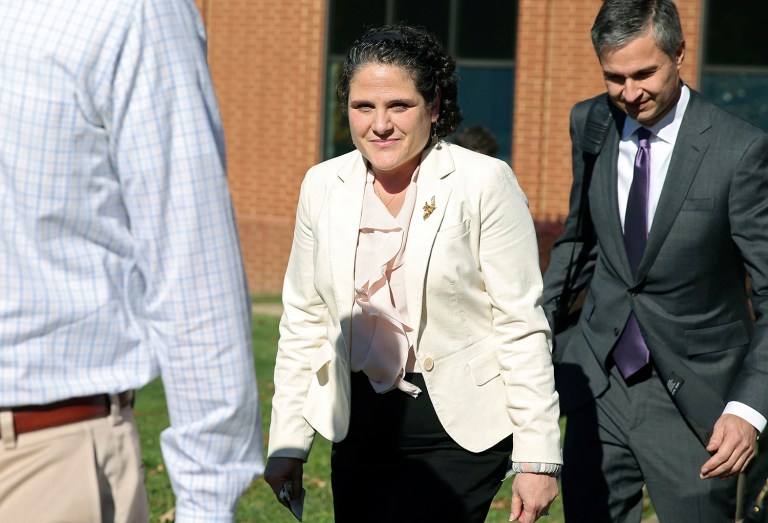 University of Virginia administrator Nicole Eramo, center, leaves the federal courthouse in Charlottesville, Va., Friday, Nov. 4, 2016. (Ryan M. Kelly /The Daily Progress via AP)