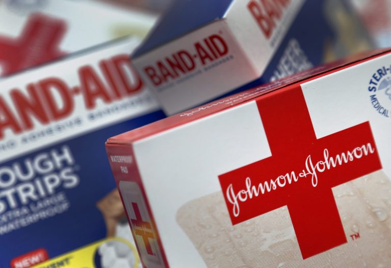 FILE - This Oct. 16 2012, file photo, shows Johnson and Johnson products, including Band Aid brand adhesive bandages, arranged for a photo in St. Petersburg, Fla. Johnson & Johnson reports qurterly financial results on Tuesday, July 15, 2014. (AP Photo/Chris O'Meara, File)
