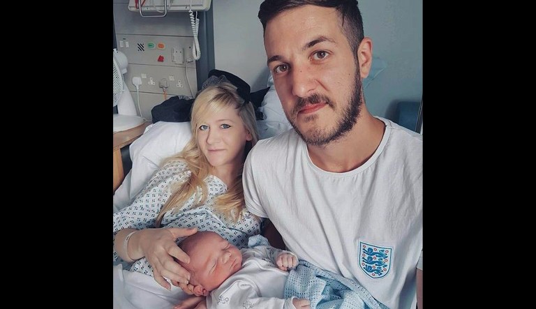 Chris Gard and Connie Yates with their son Charlie Gard in London. 
