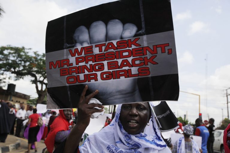 A woman attends a demonstration in Lagos, Nigeria, on Monday, May 5, 2014, urging the government to increase efforts to rescue the hundreds of abducted female students from a government secondary school. Saratu Angus Ndirpaya, the leader of a protest march, said Nigeria's first lady ordered her and another protest leader to be arrested Monday. The two were accused by the first lady of belonging to the Islamic insurgent group blamed for the abductions. Police say that nearly 300 girls and young women were abducted in mid-April from Chibok Government Girls Secondary School. At least 53 girls are known to have escaped. (AP Photo/Sunday Alamba)