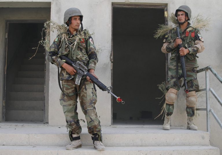 Afghan National Army officers take part in a training exercise at a National Army base on the outskirts of Kabul, Afghanistan on Oct. 8. (AP/Ahmad Jamshid)