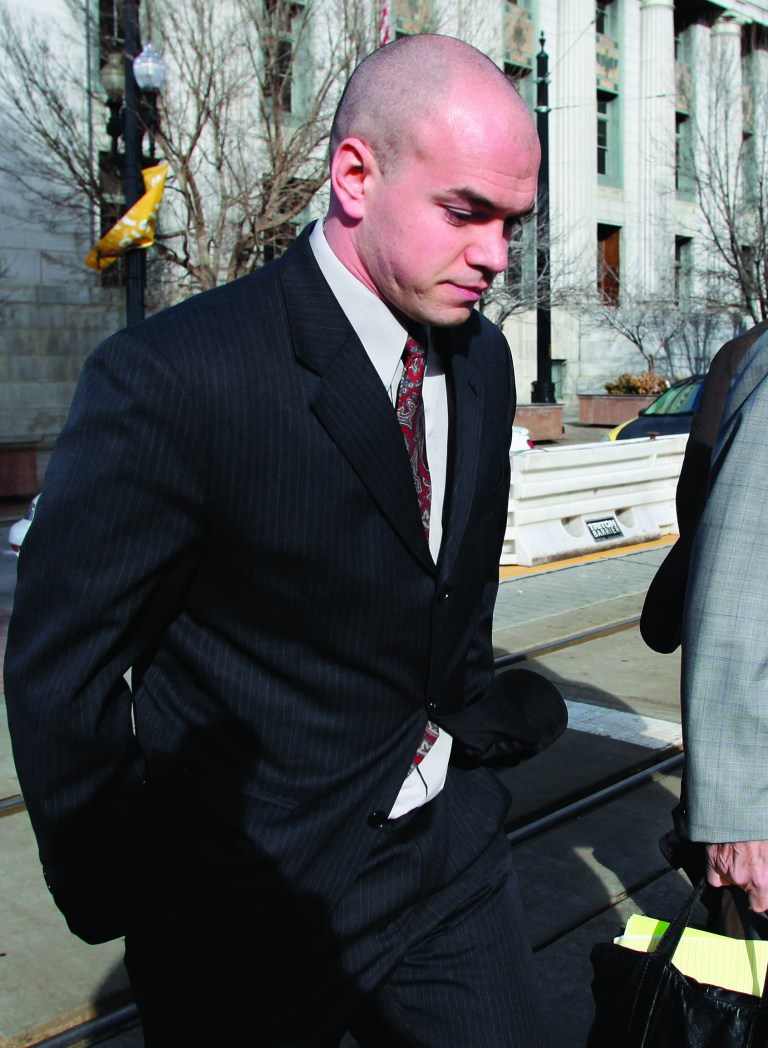 FILE - This Feb. 28, 2011 file photo environmental activist Tim DeChristopher leaves the Frank E. Moss Federal Courthouse in Salt Lake City. A federal appeals court has upheld U.S. Interior Secretary Ken Salazar's decision to suspend 77 oil and gas parcels sold in Utah in the final year of the Bush administration. The Denver-based U.S. 10th Circuit Court of Appeals said bidders missed a 90-day deadline to file a lawsuit against the federal government. It was the same auction where a Utah environmental activist jumped into the bidding to protest the sales and safeguard parcels around national parks.Tim DeChristopher is now serving two years in federal prison for disrupting the December 2008 auction in Salt Lake City. (AP Photo/Jim Urquhart, File)