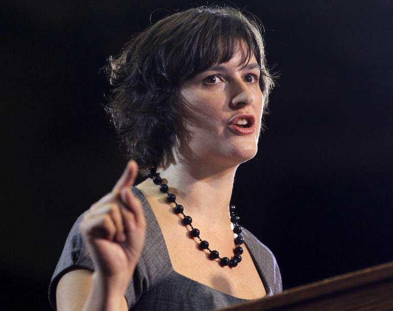 Sandra Fluke introducing President Barack Obama at a campaign event in Denver, Wednesday, Aug. 8, 2012. Fluke inadvertently gained notoriety when talk show host Rush Limbaugh spoke disparagingly of her testimony before Congress on the issue of contraception and insurance coverage. (AP Photo/Pablo Martinez Monsivais)