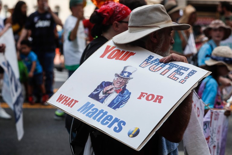 Polling shifts wildly during and immediately after political conventions. (AP Photo/John Minchillo)