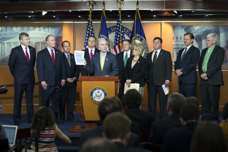 House Budget Committee Chairman Rep. Tom Price, R-Ga., center, along with Republican members of the committee, announces the House Republican budget proposal, Tuesday, March 17, 2015, on Capitol Hill in Washington. (AP Photo/Cliff Owen)