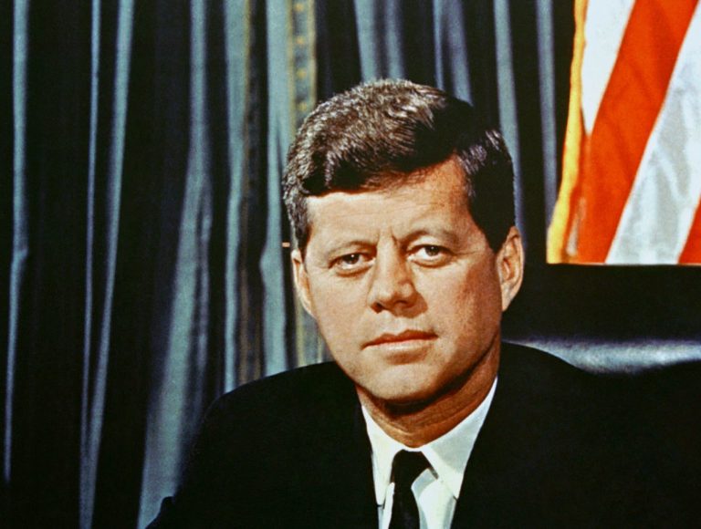 A new book timed for the 50th anniversary of John F. Kennedy's assassination in Dallas Nov. 22, 1963 reveals that four doctors and two medical students among the first to see the former president believe that a hole below JFK's Adam's apple came from a shot fired in front of his car, a second-shooter theory dismissed by the controversial Warren Commission.ÃÂ (AP Image)